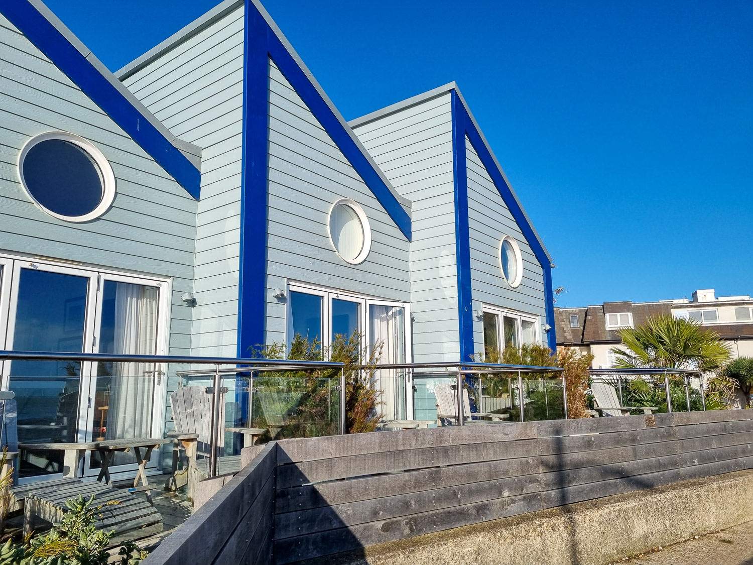View of the beach hut apartments, accommodation on the seafront belonging to the Beachcroft hotel Felpham - my review of a stay at the Sussex hotel with kids