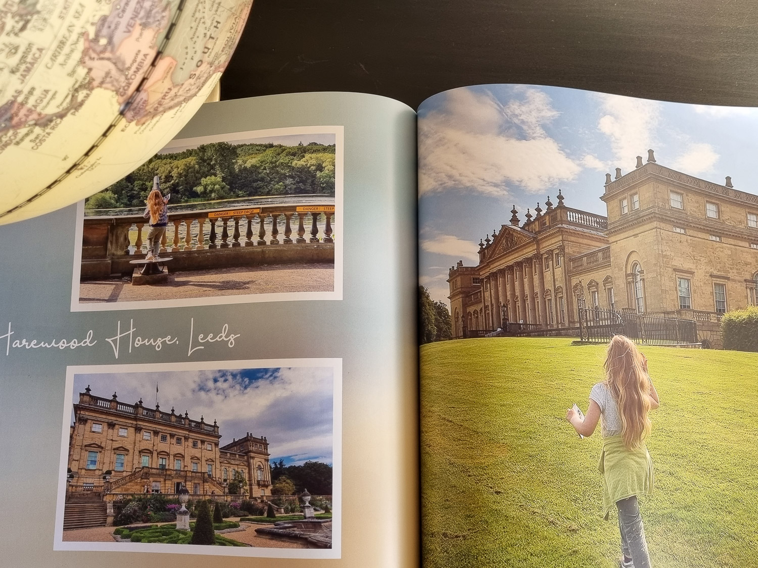 Open photo book showing photos of a family day out at Harewood House in Leeds, and a globe just seen, created as part of my My Picture review of photo printing services