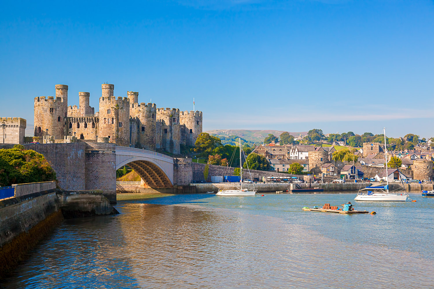 View along the river to Conwy Castle in Wales, one of the best Unesco World Heritage sites in the UK with kids