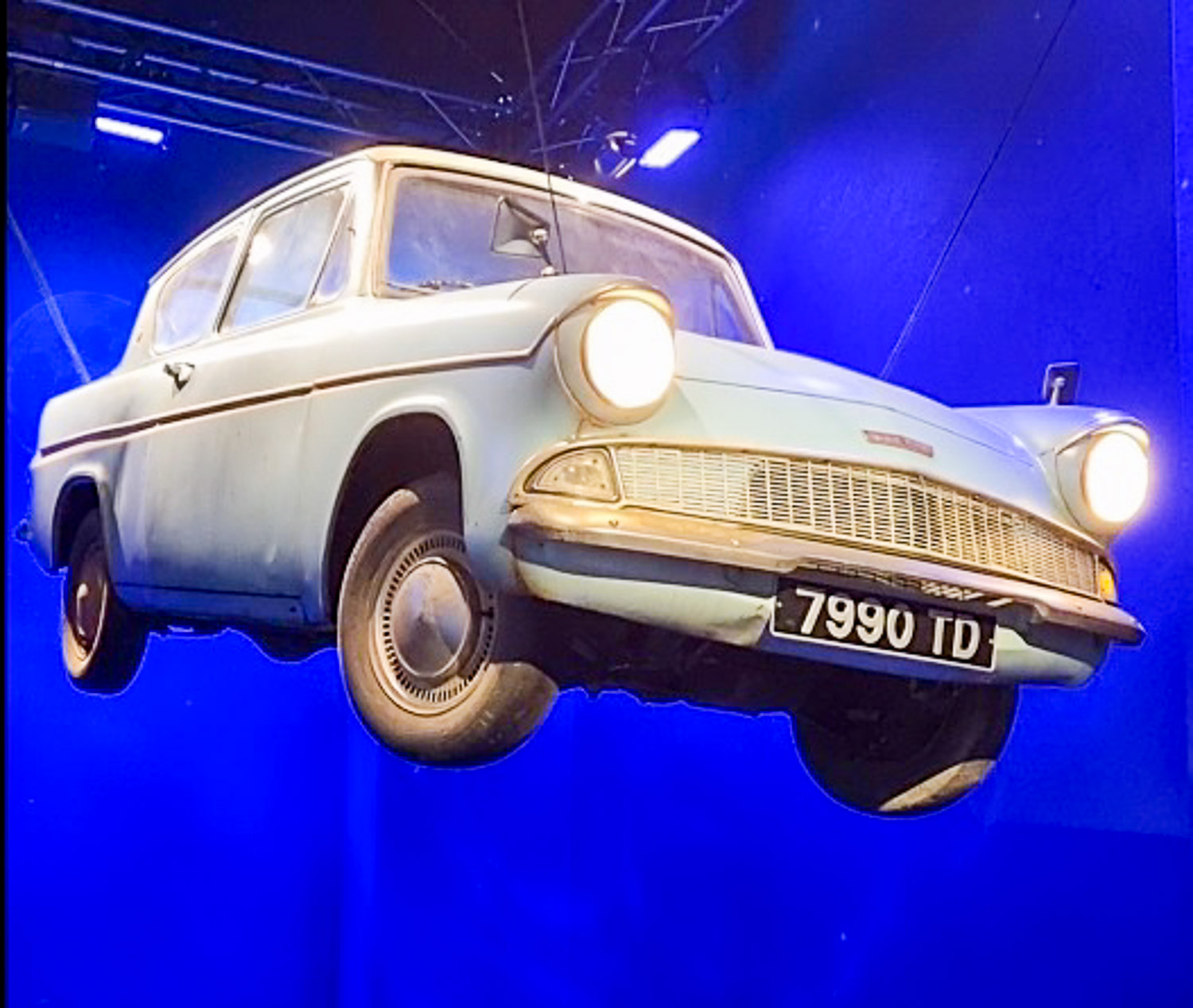 'Flying' Ford Anglia suspended above the staircase at the entrance to London's Harry Potter Photo Exhibition in Covent Garden - my review of a visit with kids