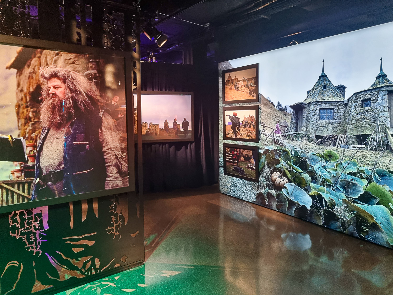 Photos of Robbie Coltrane as Hagrid and the set with his hut during a visit to the Harry Potter Photographic Exhibition with kids in Covent Garden