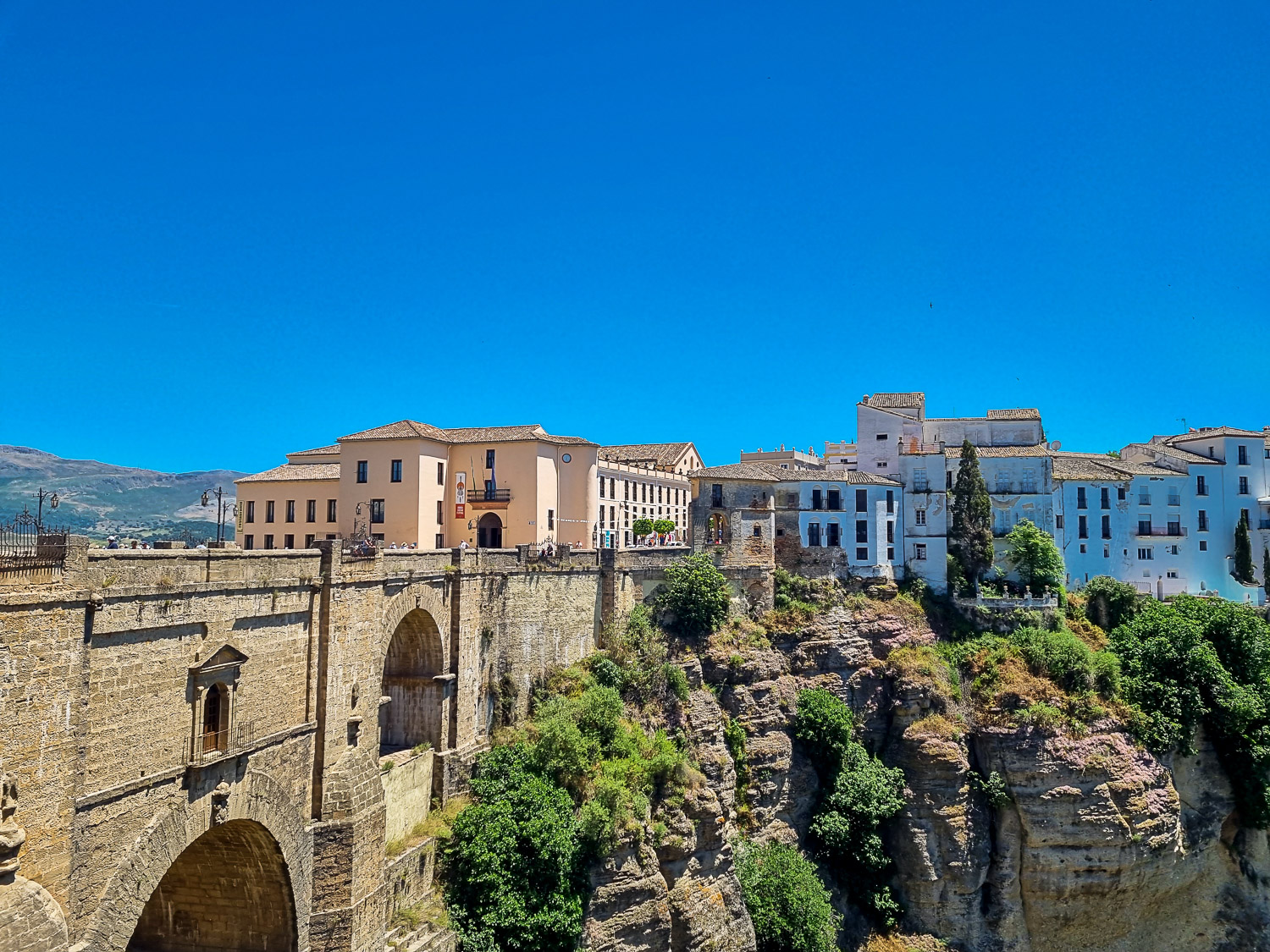 View towards the 'new bridge' in Ronda which towers above the gorge between the old town and the new - looking back on our latest year of family travel, including my daughter's first trip to the mainland of Spain
