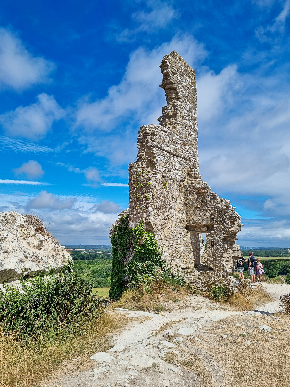 Ruined section of wall at the edge of the hill where Corfe Castle stands - my tips on things to do at Corfe Castle with kids