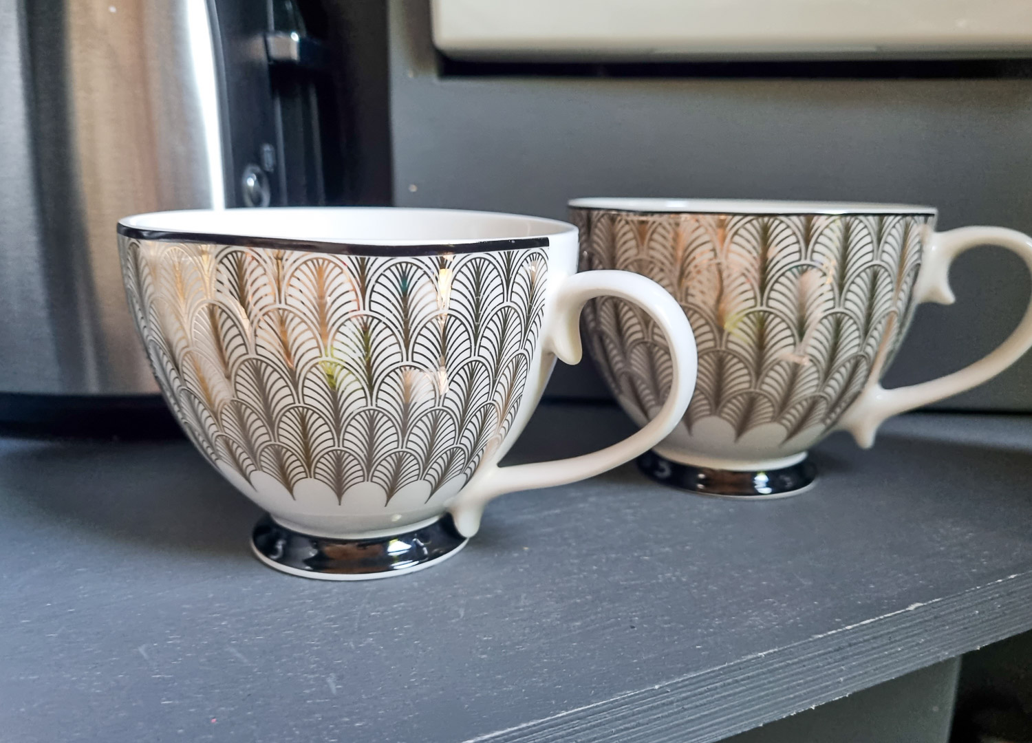 Close-up of two art deco-style cups at Knole Luna dome - a luxury glamping stay at Hoath House in Kent with kids