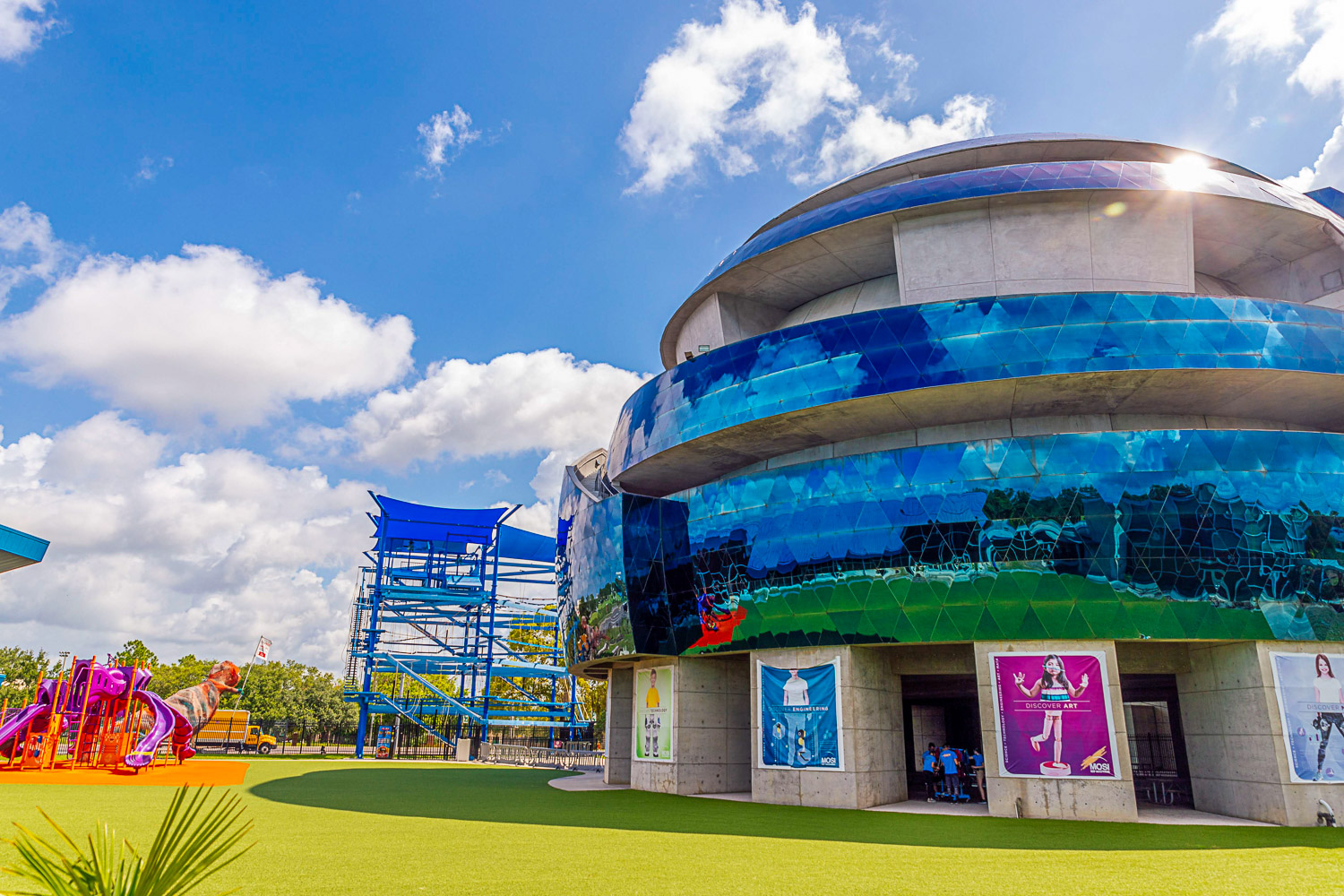 Curved reflective exterior of MOSI Tampa - with lots of hands-on activities, it's one of the best things to do in Tampa with kids