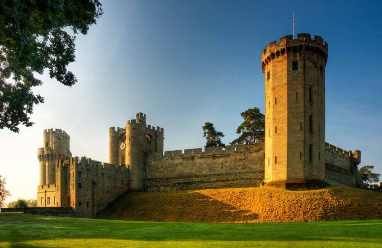 View of Warwick castle against blue sky - visiting Warwick Castle with a toddler