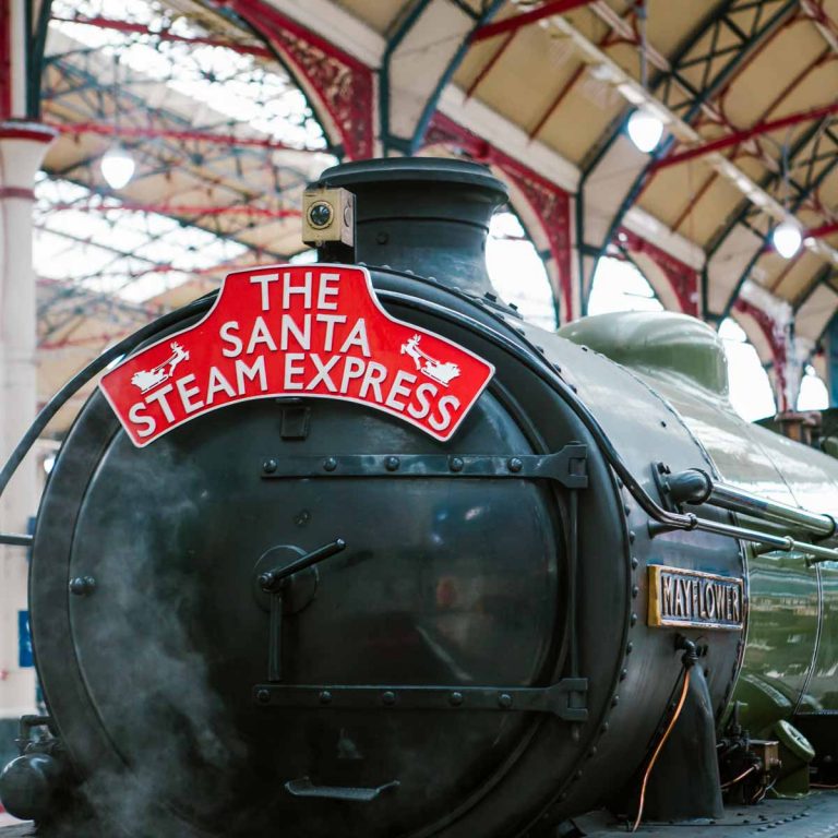 The Santa Steam Express train in a platform - the Mayflower engine is one of those used for the special festive Santa steam train rides in London