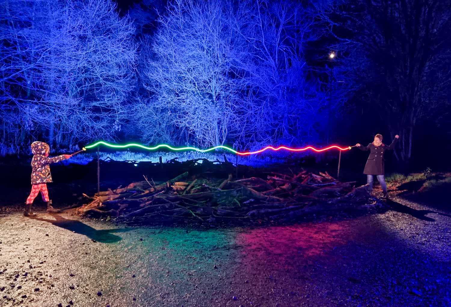 Myself and my daughter in a wand battle, one of the interactive experiences at the Harry Potter Forbidden Forest Experience in Cheshire - my review
