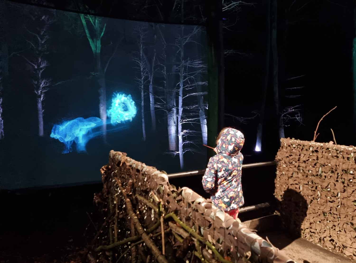 My daughter casts a patronus, one of the interactive experiences at the Harry Potter Forbidden Forest Experience in Cheshire - my review
