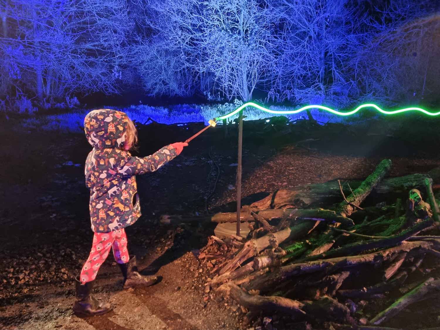 My daughter in a wand battle, one of the interactive experiences at the Harry Potter Forbidden Forest Experience in Cheshire - my review