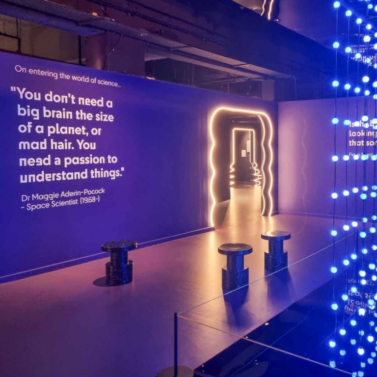 Room containing a display with an array of different coloured light bulbs at London's Museum of Illusions - my review of Twist Museum with kids