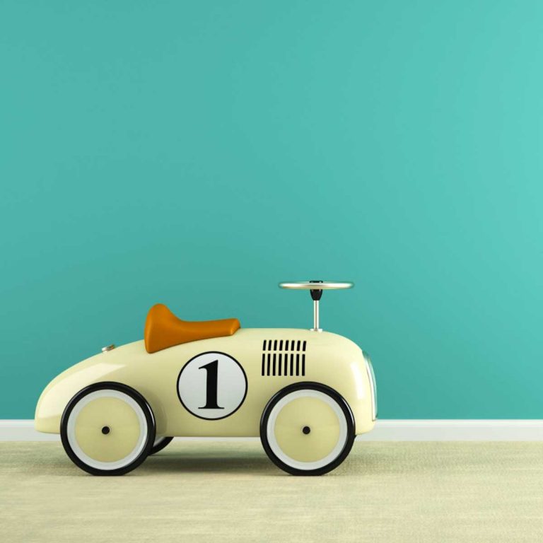 A retro vintage style toy car - should you pack your own car seat for travel?