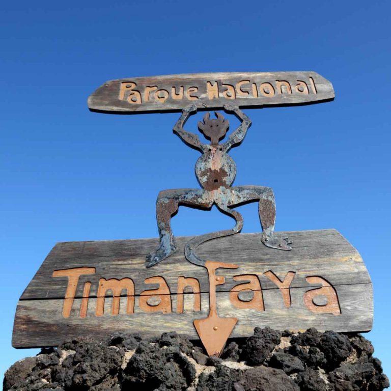 The devil sign at the entrance to Timanfaya National park in Lanzarote against a blue sky - my top things to do in Lanzarote with kids