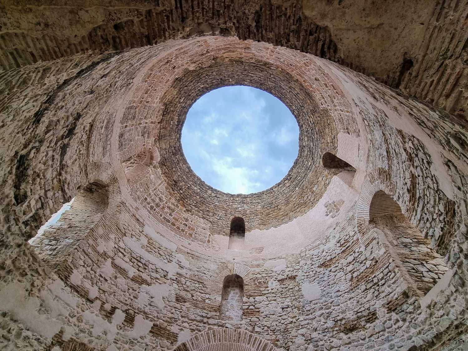 Blue sky seen through the hole in the roof of the Vestibule, part of Diocletian's Palace and one of the best places to visit in Split with kids