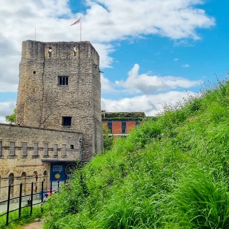 View across the old motte, or mount, to St George's Tower and more of Oxford Castle and Prison on a sunny day - review of Oxford Castle with kids
