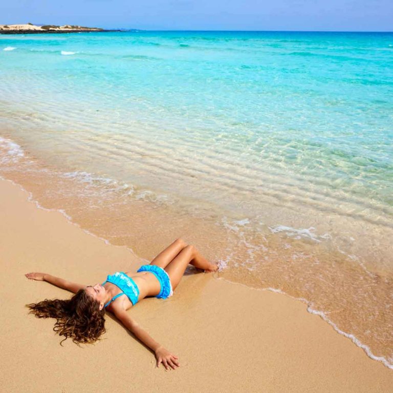 Girl on the beach Fuerteventura at Canary Islands of Spain - my top things to do in Fuerteventura with kids