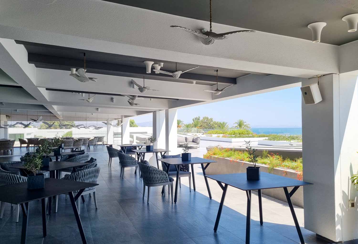 View across Edesma restaurant on the first floor of Gennadi Grand resort looking out to the sea - my Gennadi Grand Resort review of a stay in Rhodes with kids
