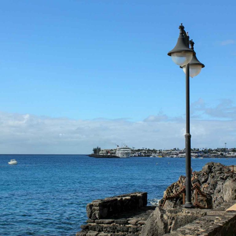 The pedestrian promenade at Playa Blanca in Lanzarote on the way to Marina Rubicon - find some of the best places to eat in Playa Blanca with kids