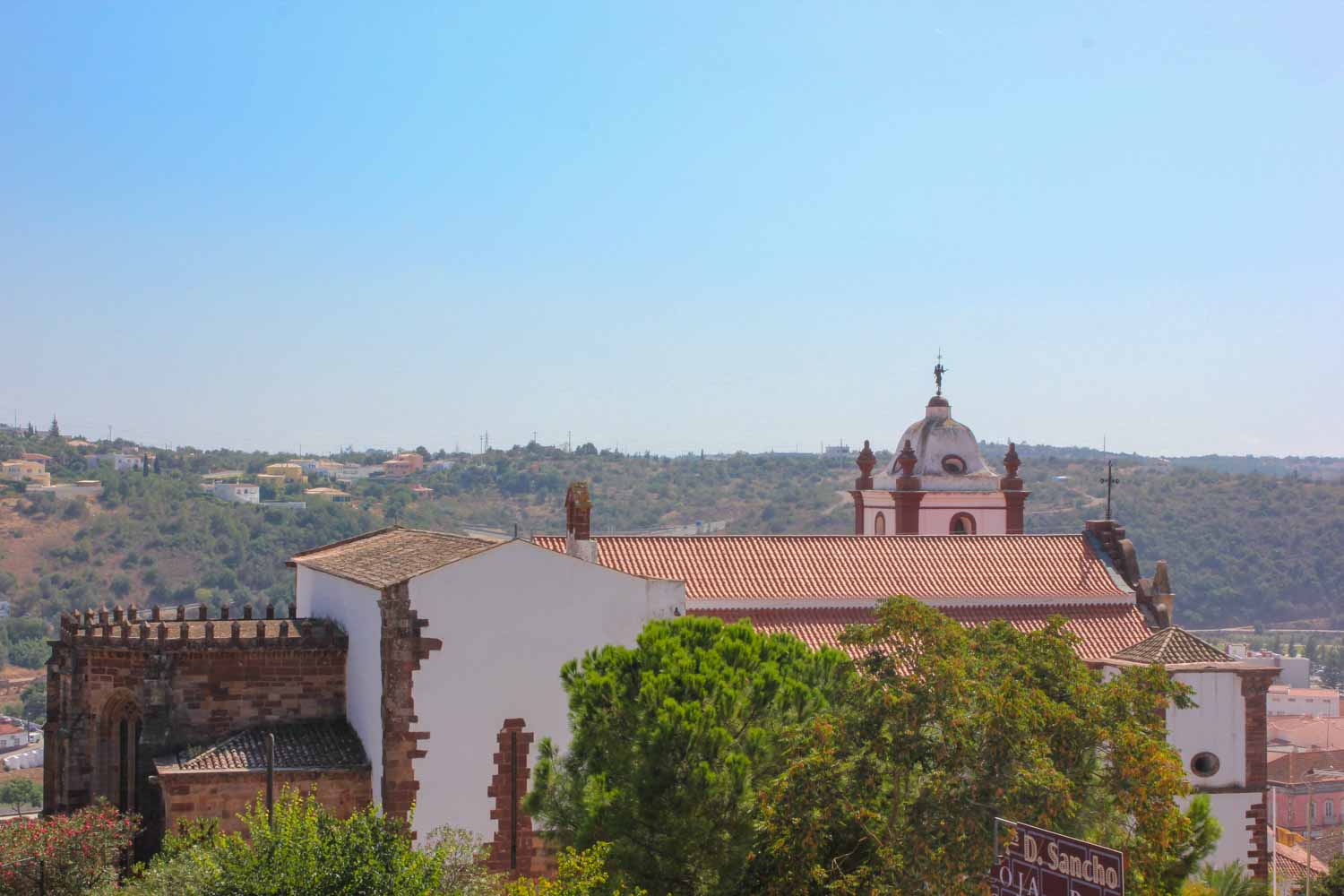 A view from Silves Castle in the Algarve to the town's cathedral during a day out in the Algarve with kids