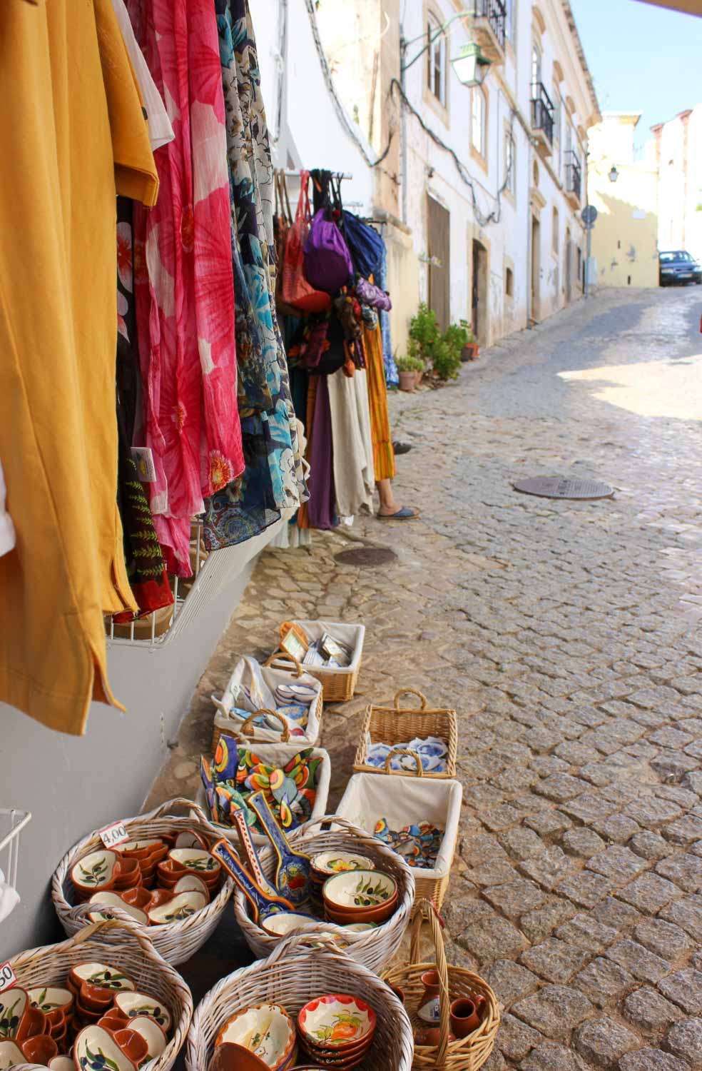 Baskets piled up with souvenirs under clothes in Silves - wander the town after you visit Silves Castle with kids