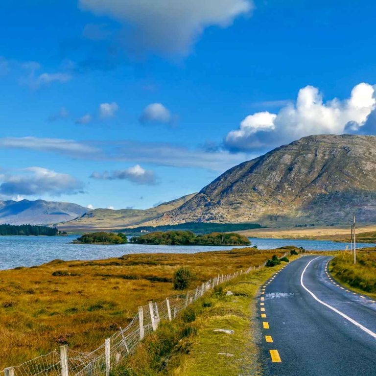 A road by Inagh Lake in Connemara, Ireland - my four road trip ideas from Dublin if you're visiting Ireland with kids