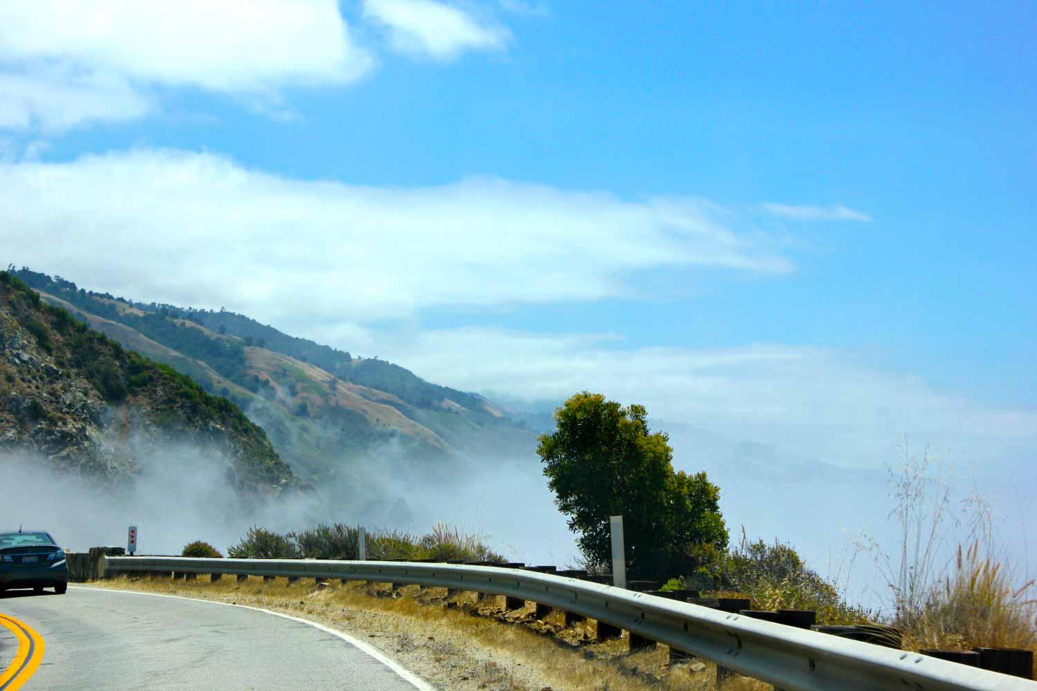 Taking our rental car out onto the Pacific Coast Highway in California - and tips in my pacific coast road trip itinerary, how to do a California road trip with kids