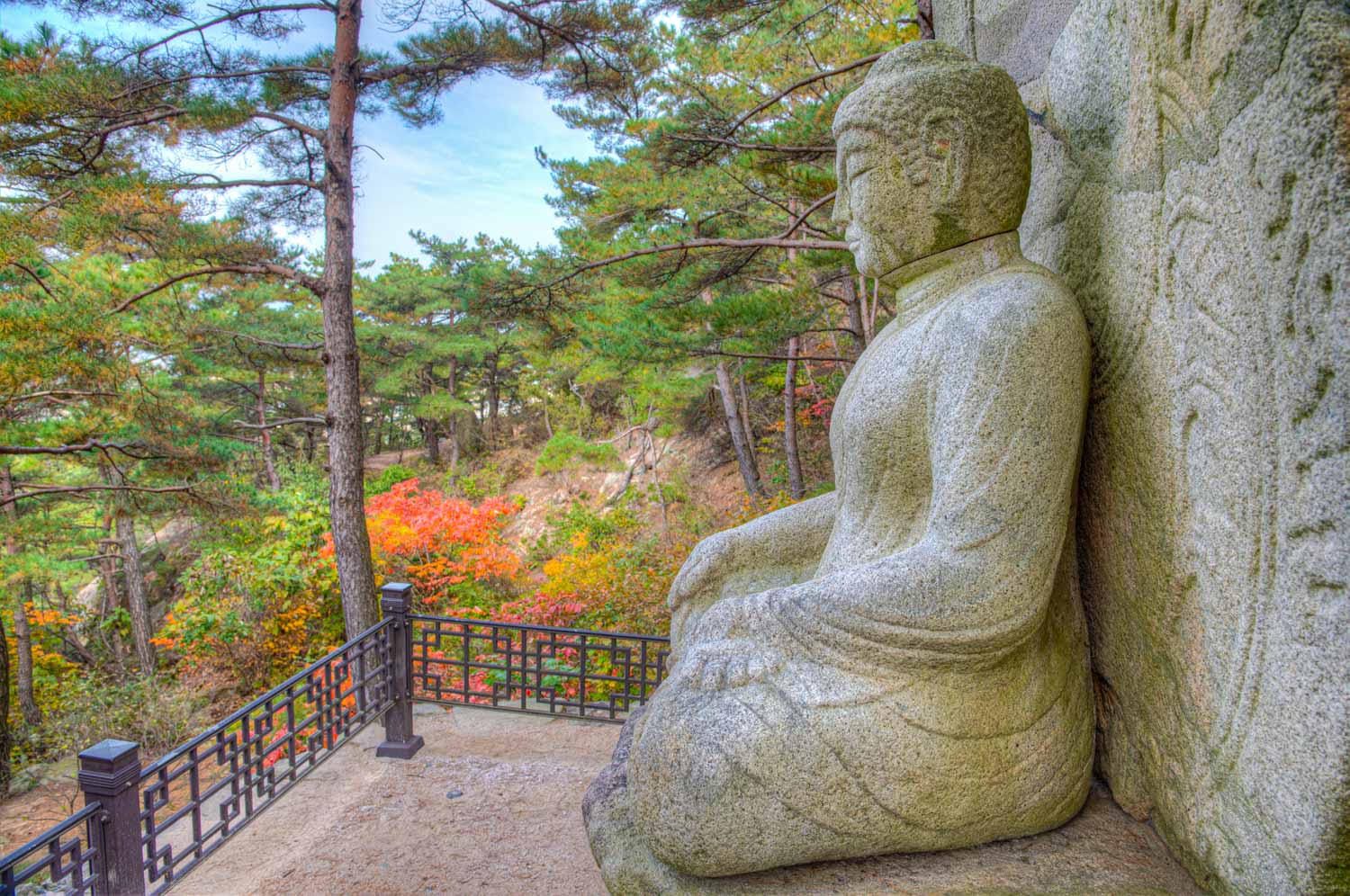 Buddha statue at Namsan national park - one of the highlights of a walk up the mountain from Gyeongju with kids