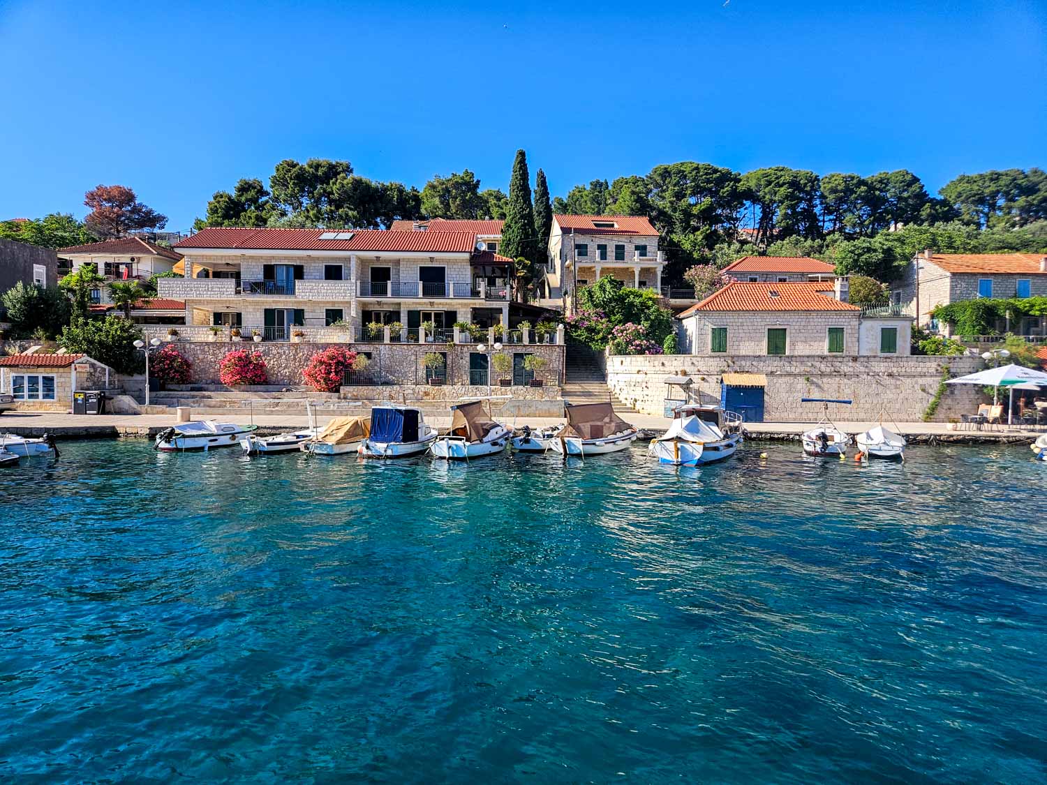 View of the stone buildings at Maslinica on the island of Solta, the last stop on our Croatia sailing holiday with kids