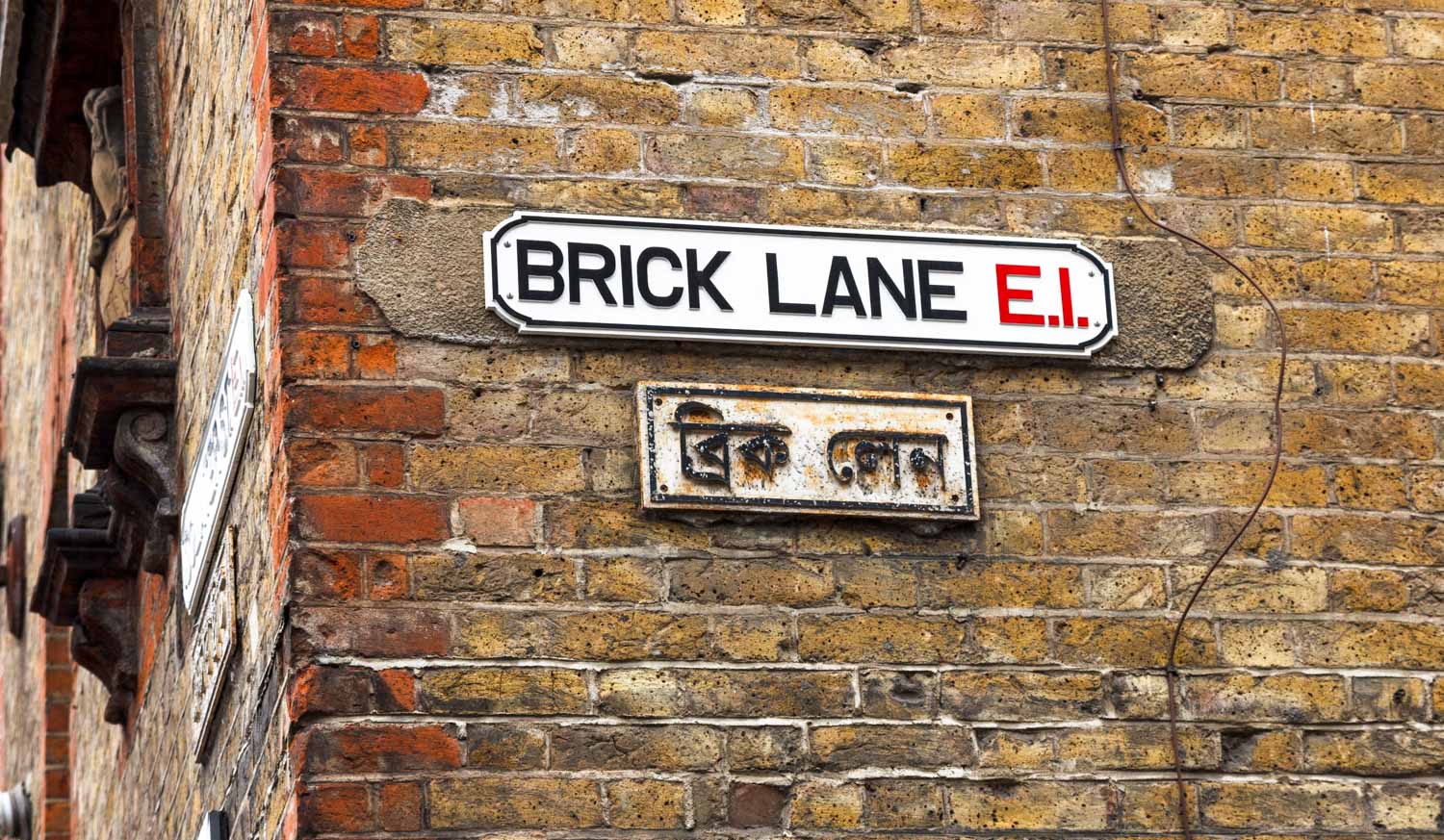 Brick Lane street sign in London's East End - one of the places to visit during a stay at Courthouse Hotel Shoreditch with teens