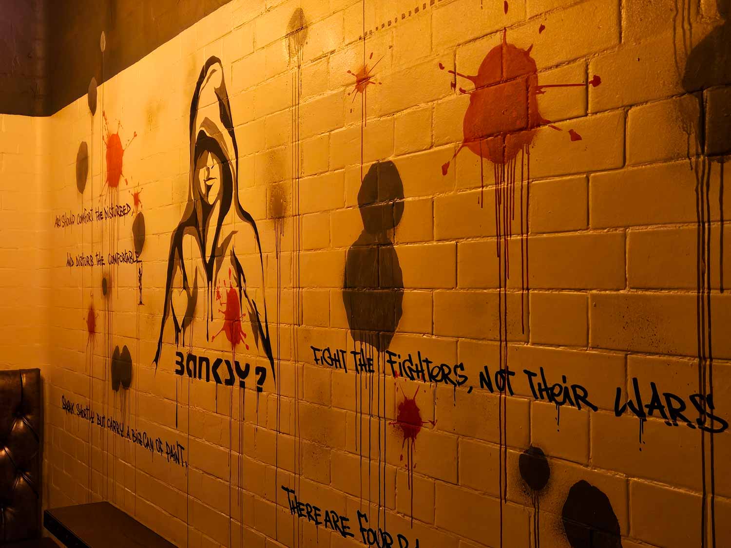 Artwork showing Banksy inside one of the converted cells in the Jailhouse Bar - my Courthouse Hotel Shoreditch review