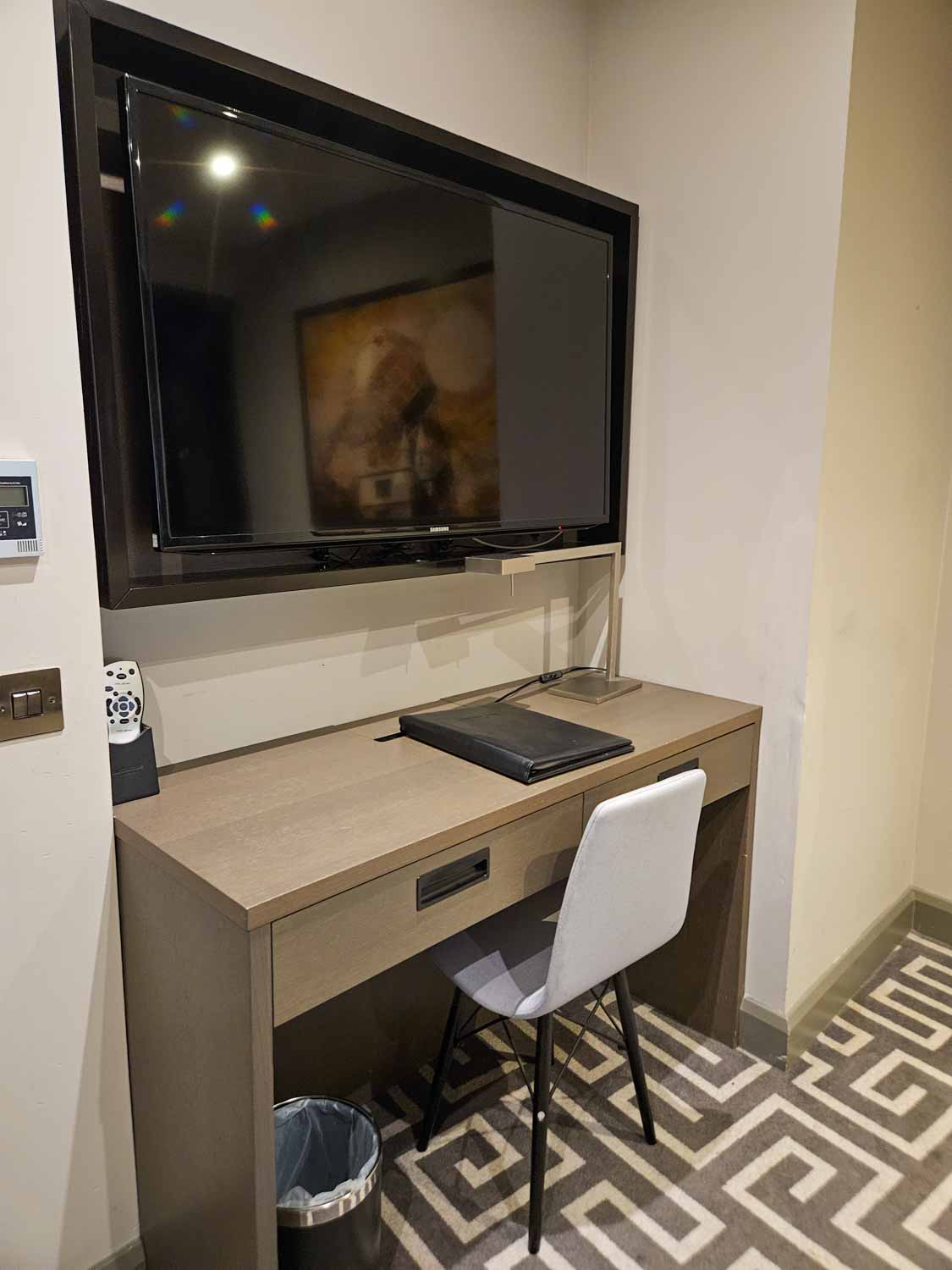 Desk with TV above in our Hoxton Family suite - my Courthouse Hotel Shoreditch review