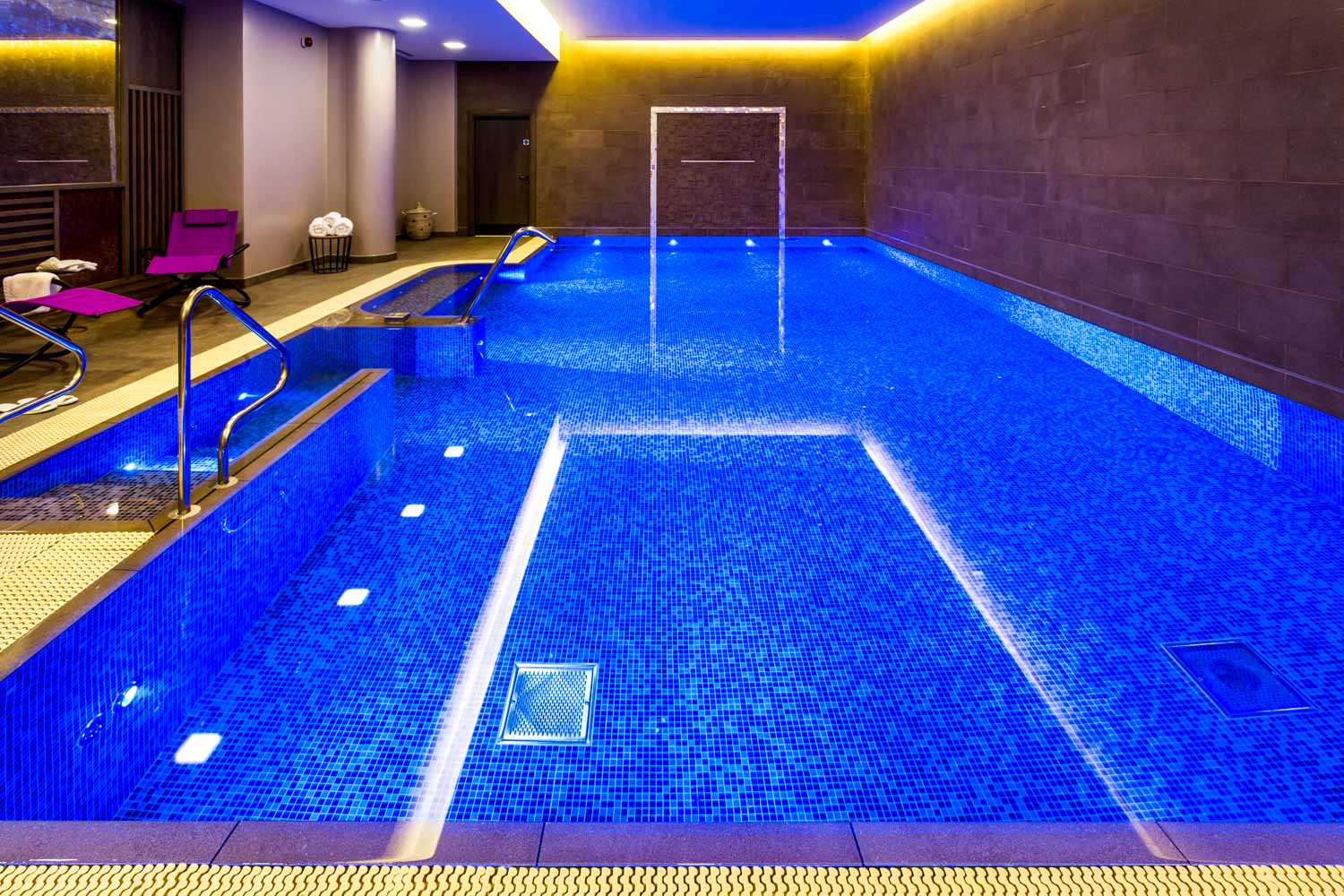 View of the pool and loungers at the Courthouse Shoreditch hotel - my Courthouse Hotel Shoreditch review