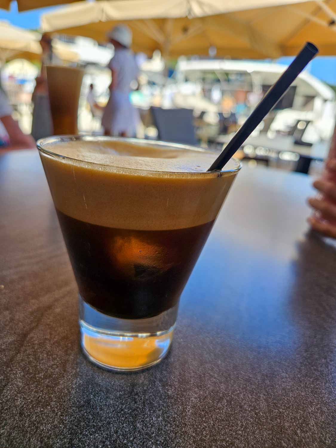 Espresso freddo in one of the many little cafes lining the harbour - what to do during one day in Fiskardo with kids