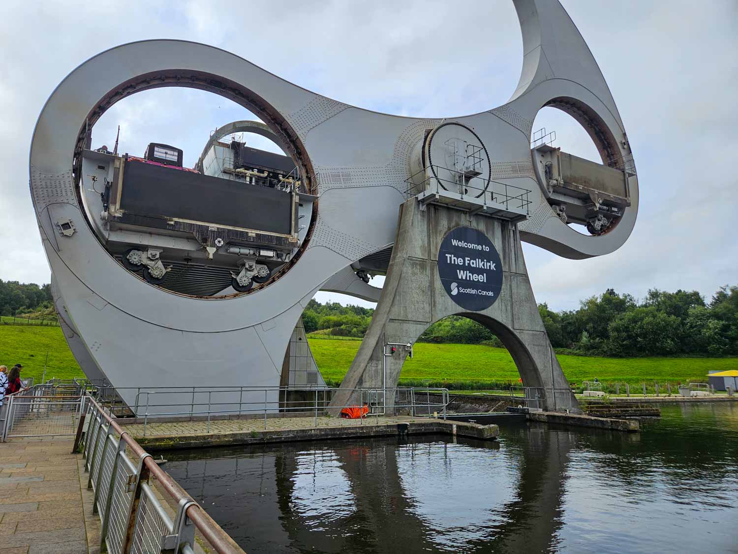 Canal tour boat in the Falkirk Wheel boat lift - a visit is one of the best things to do in Falkirk with kids during a Scotland family road trip