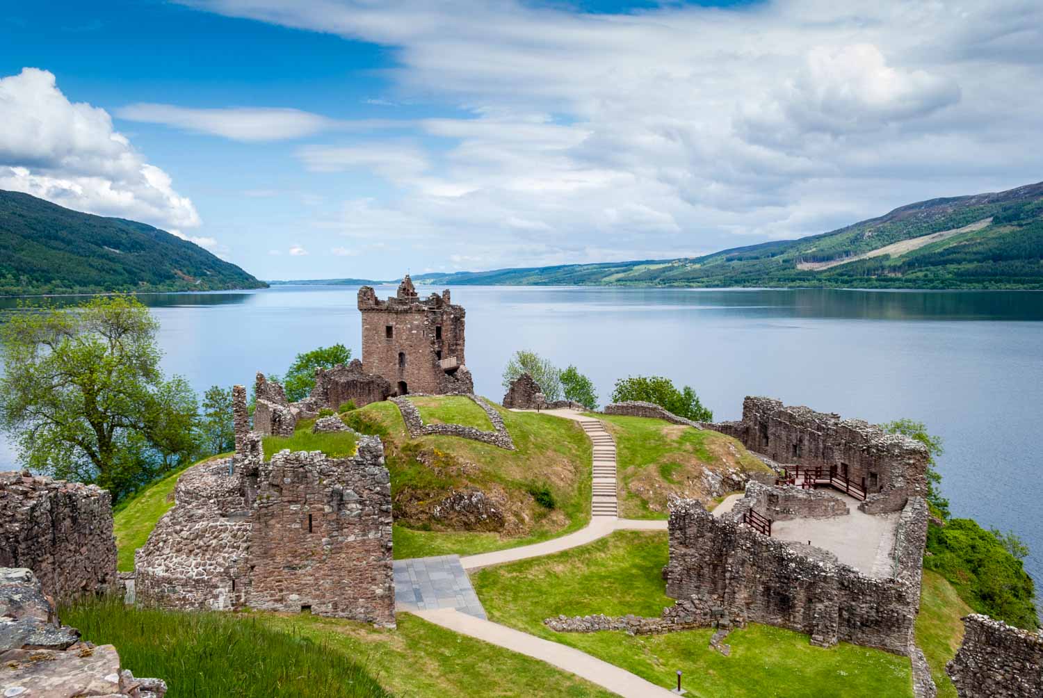 Ruins of Urquhart Castle on Loch Ness - one of the great places to visit on a Scotland road trip with kids
