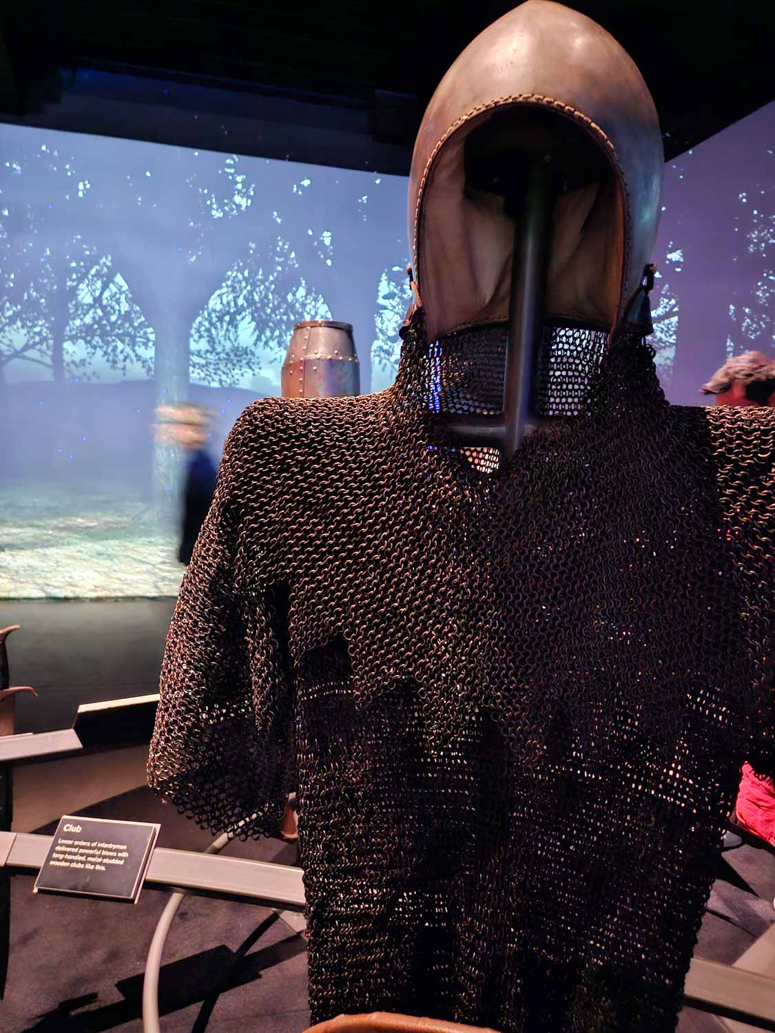 Chainmail and armoured helmet, among the interactive displays at Bannockburn - the Bannockburn Experience is one of the best things to do in Stirling with kids
