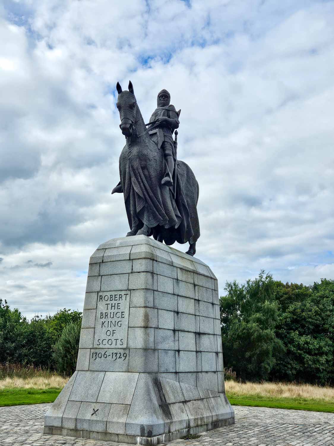 Statue of Robert the Bruce on his horse at Bannockburn, on the site of the historic battlefield - the Bannockburn Experience is one of the best things to do in Stirling with kids