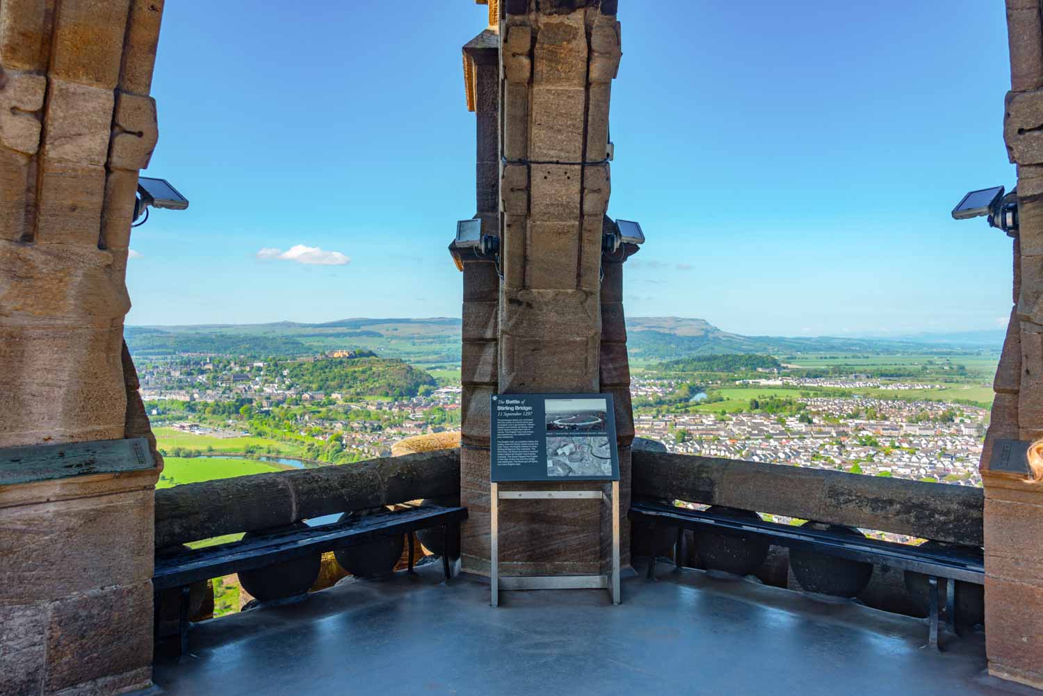 View across the city and hills from the top of the National Wallace Monument - a visit is one of the best things to do in Stirling with kids