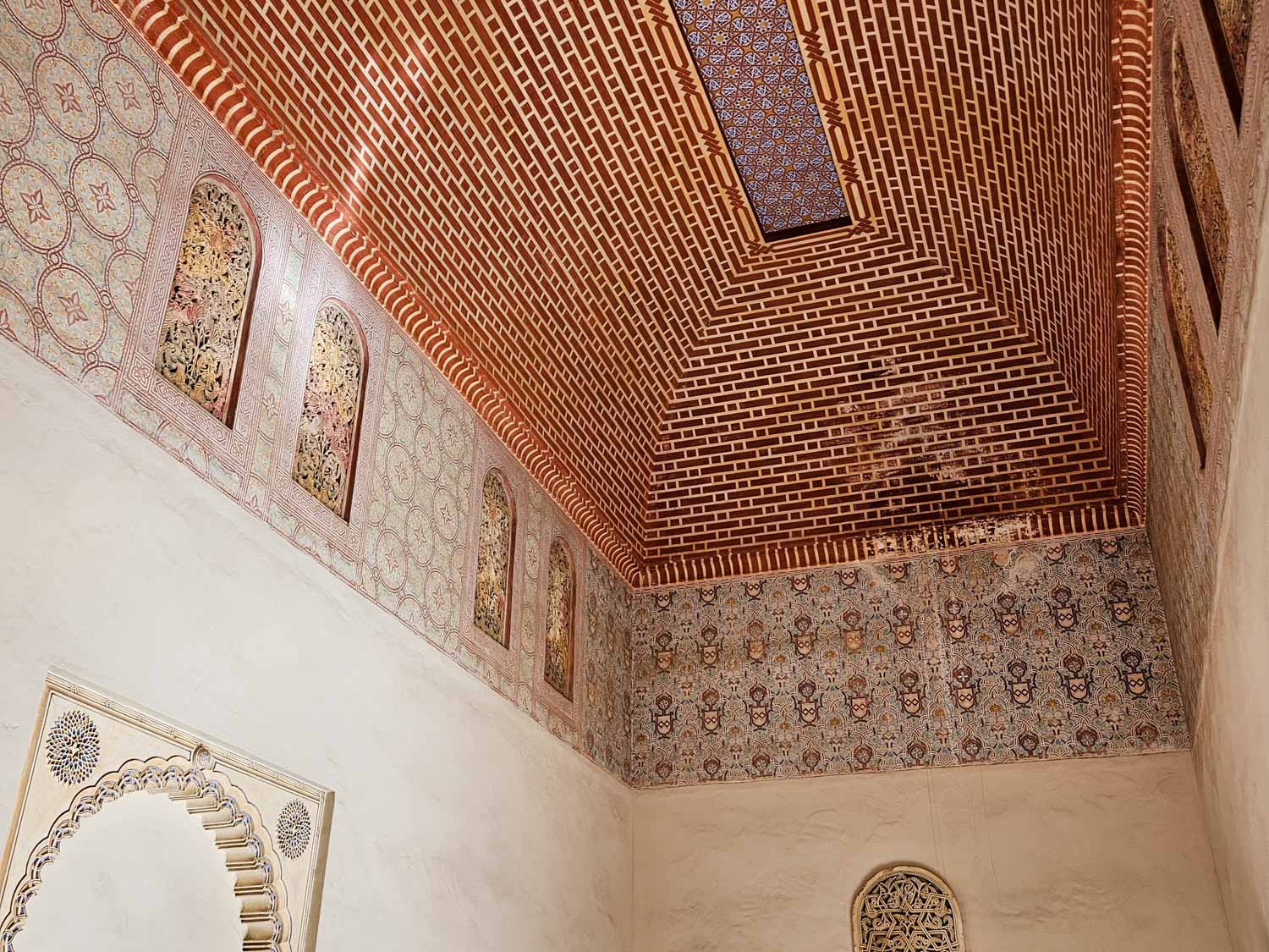 Decorative ceiling and arches in the palace rooms at the Alcazaba in Malaga - a visit is one of the best things to do in Malaga with kids