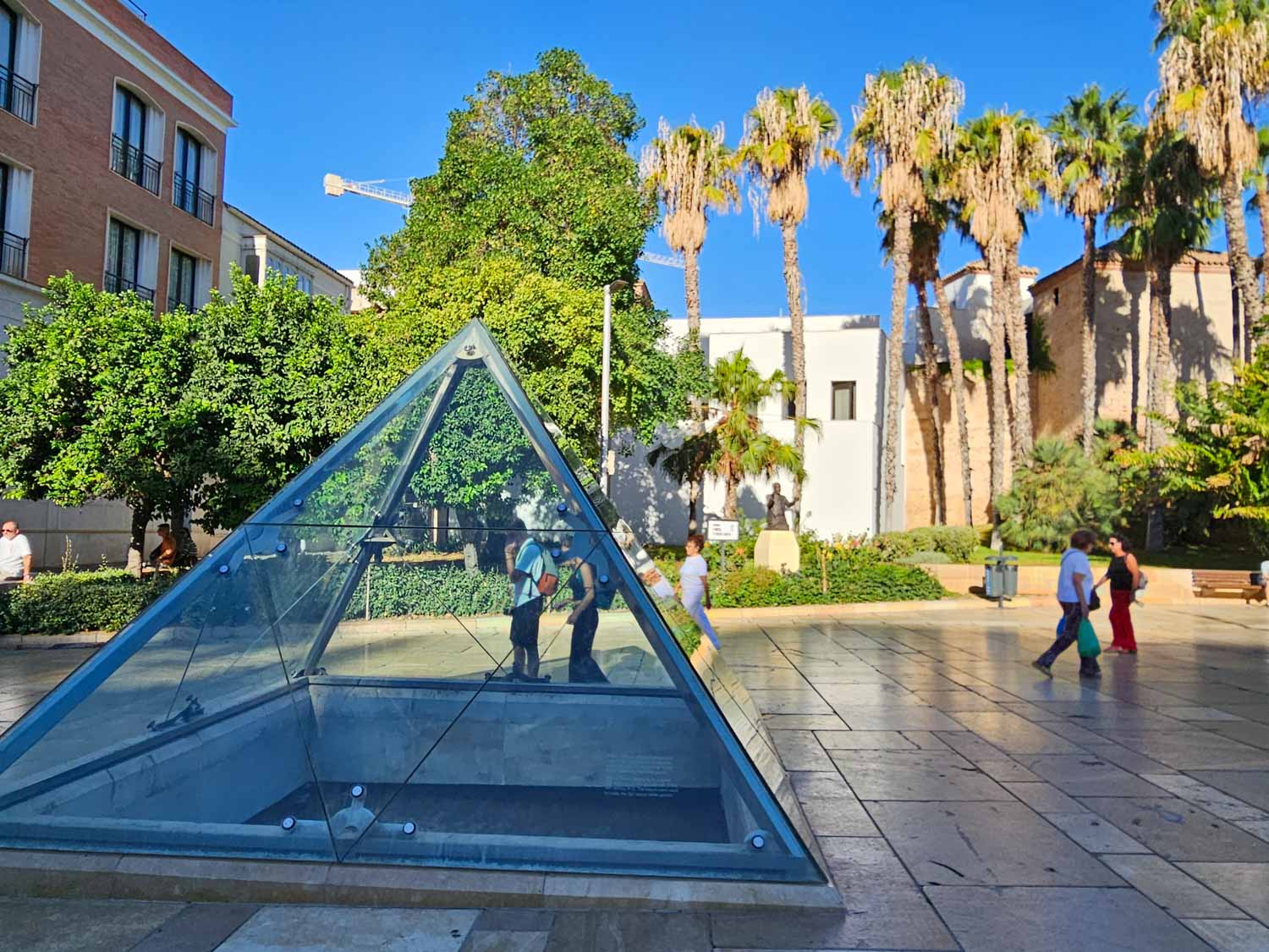 The glass pryamid protecting some of the Roman remains in Malaga - one of the many historic things to see in Malaga with kids