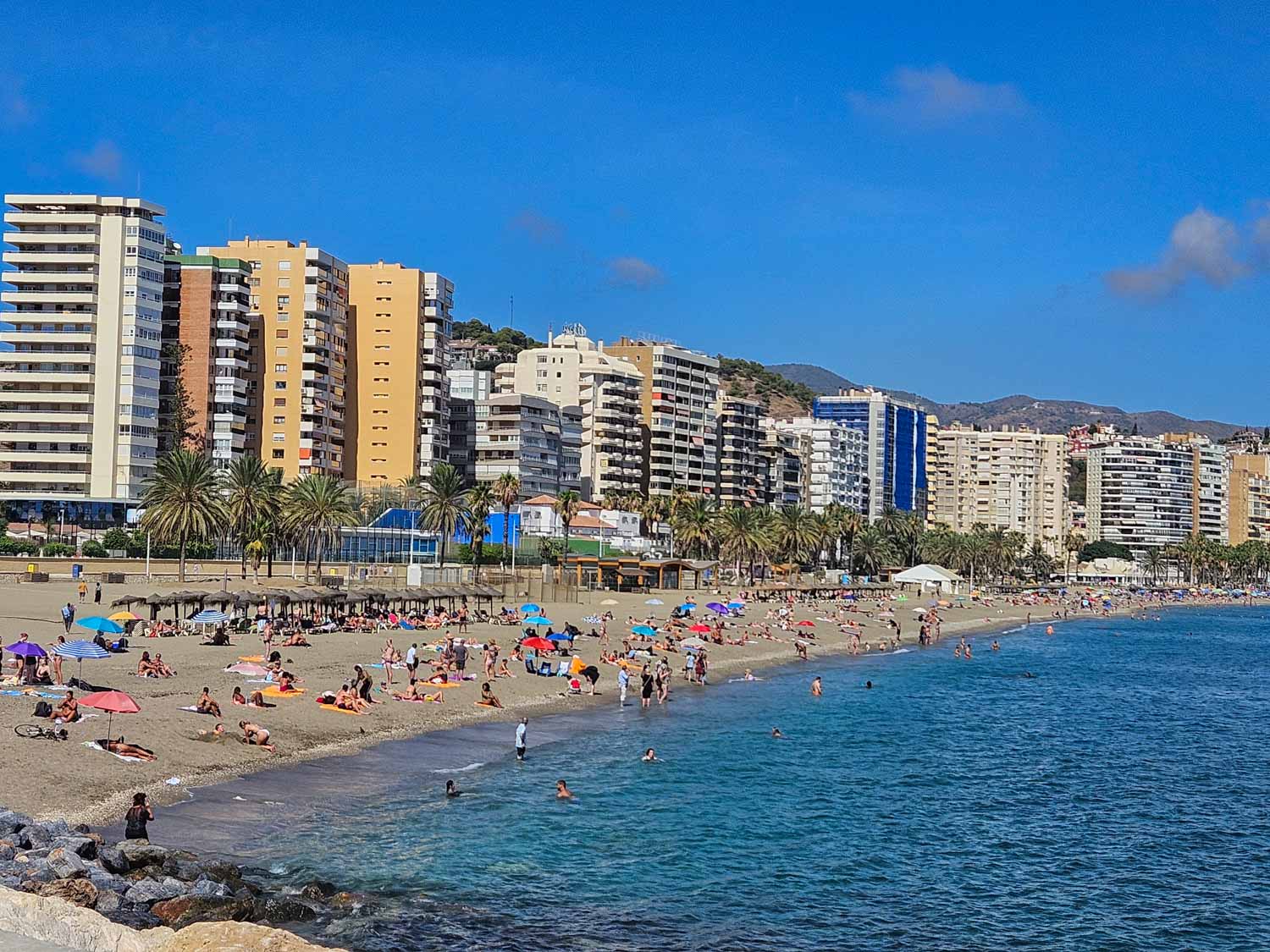View along the sand at La Malagueta beach - the closest beach to the city if you're visiting Malaga with kids