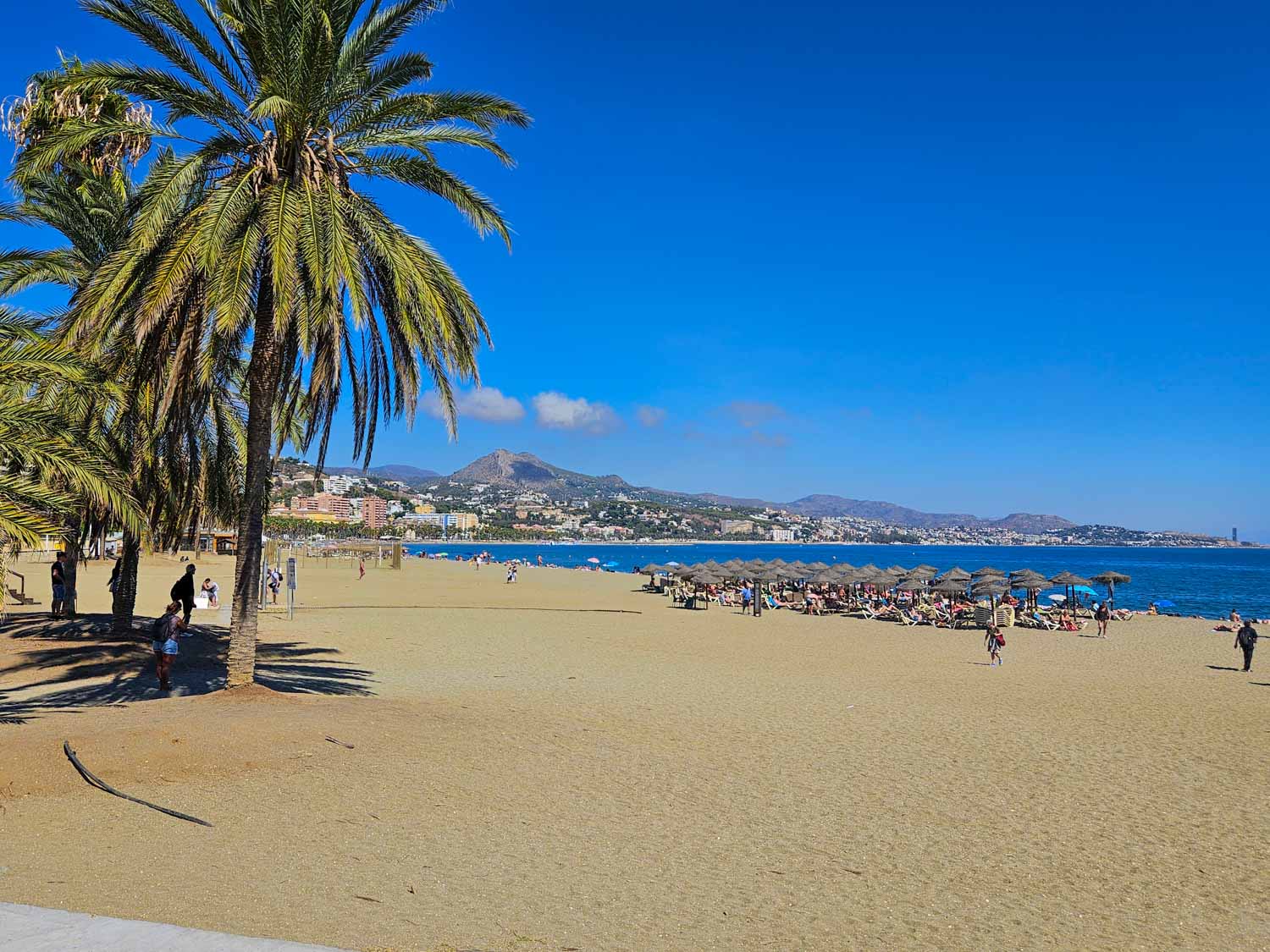 View along the sand at La Malagueta beach - the closest beach to the city if you're visiting Malaga with kids