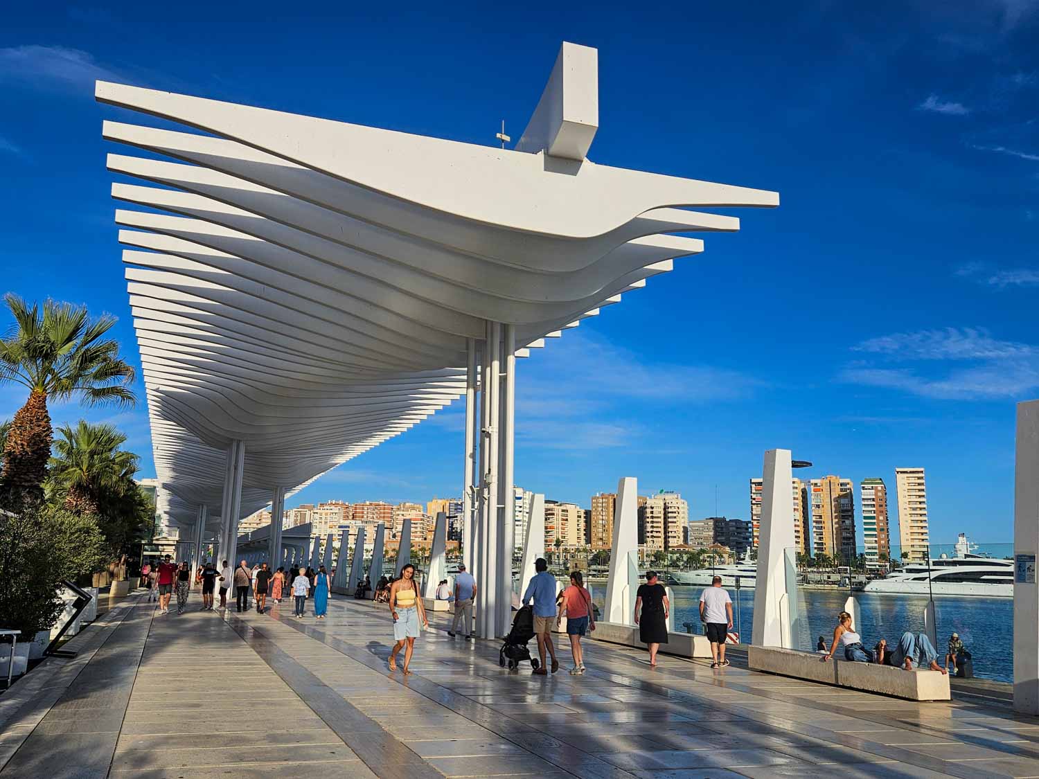 Huge white canopy known as La Pergola shading the waterfront at Muelle Uno - a visit is one of the best things to do in Malaga with kids